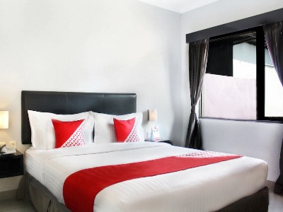 Гостиница Oyo 136 Manggis Inn
