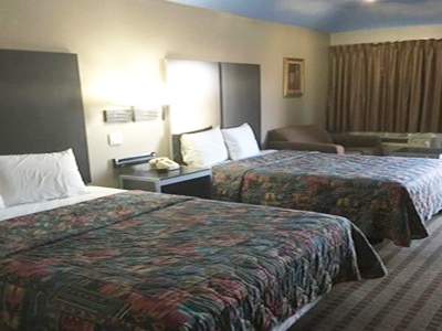 Гостиница Camelot Inn Suites Hobby/Gulf Freeway