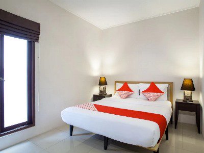 Гостиница Oyo 107 Kusuma Kemang Suite