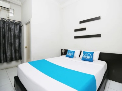 Гостиница Airy Sumahilang Sisingamangaraja 10