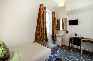 OYO The Strand Hotel