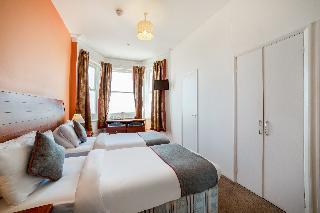 OYO The Strand Hotel