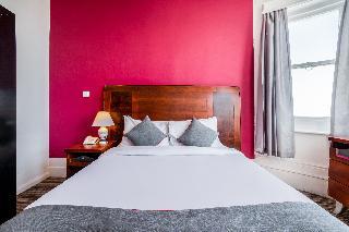 OYO The Strand Hotel