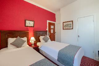 OYO The Strand Hotel