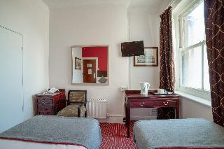 OYO The Strand Hotel