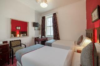 OYO The Strand Hotel