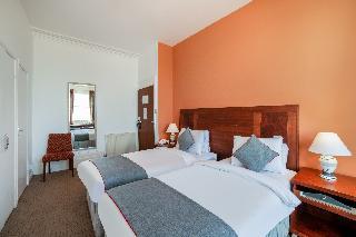 OYO The Strand Hotel