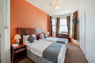 OYO The Strand Hotel