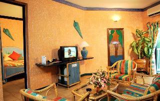 Гостиница The Beach Comber Hotel & Resort