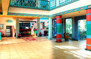 Гостиница The Beach Comber Hotel & Resort