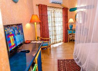 Гостиница The Beach Comber Hotel & Resort