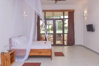 Гостиница Mnarani Beach Cottages