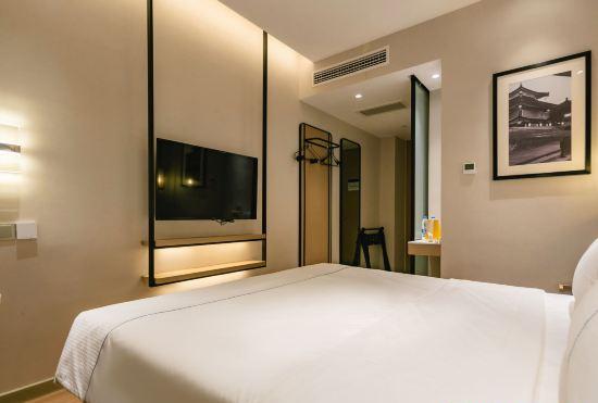 Гостиница Magnolia Hotel (Xi'an Mingguang Store)