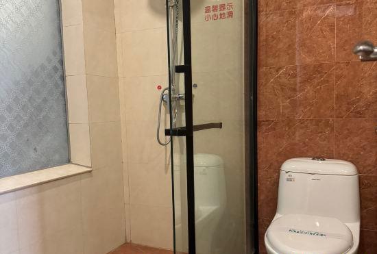 Jinghong Huaxing Business Hotel