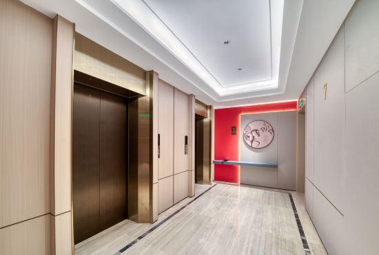 Xiaogang East Station Yi Cheng Hotel