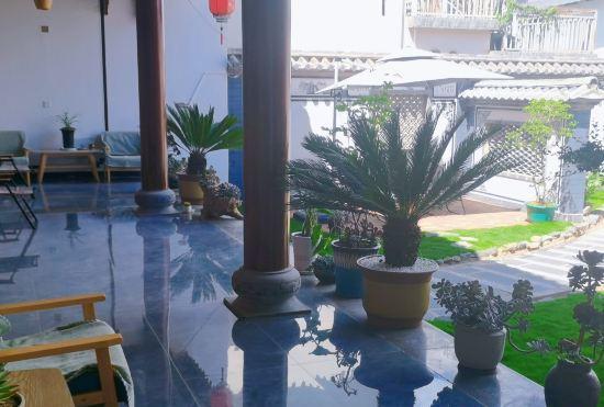 Гостиница Shaxi Xinyi Courtyard