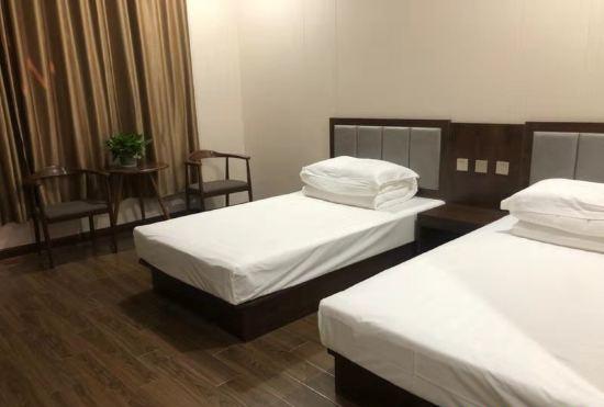 Гостиница Longkou naisi hotel