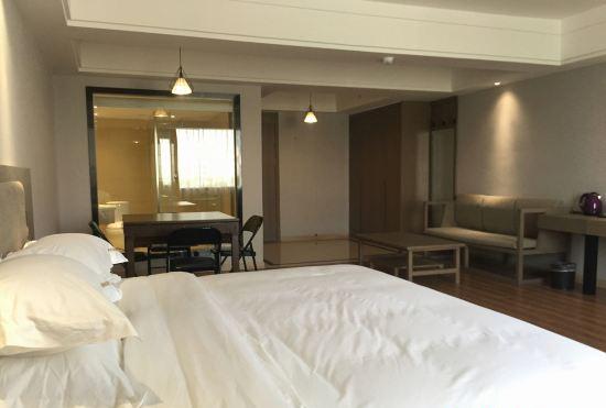 Гостиница Yushu Siji Business Hotel