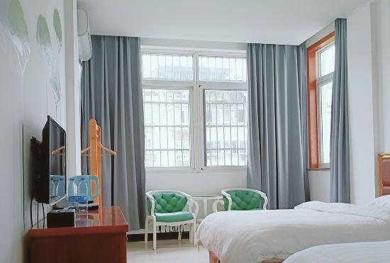 Гостиница Xiuning Xinyi Hotel