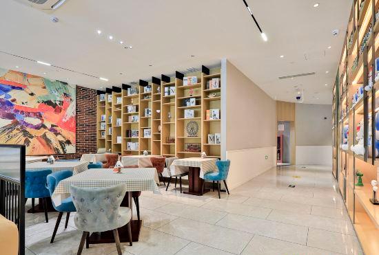 Гостиница New Century Jiaxin Manju Hotel