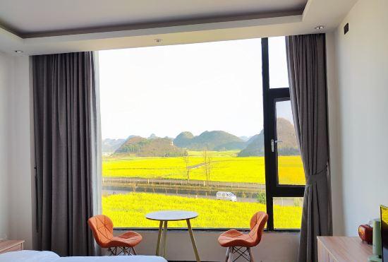 Гостиница Luoping Chunri Xiaoyuan Homestay (Jinji Peak Cong Branch)