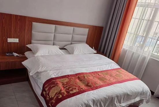Гостиница Zhenxiong Weiqian Business Hotel