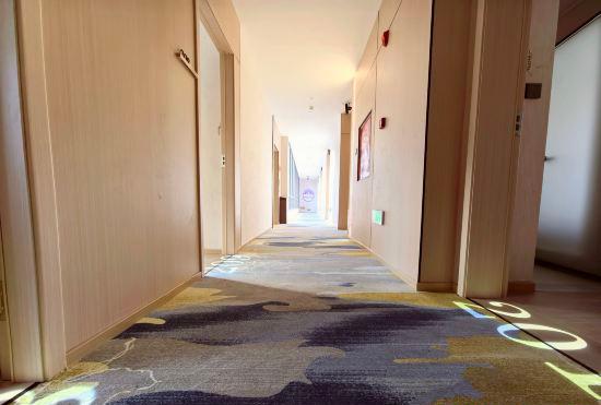 Xinduqiao Aijia Xingchen Hotel